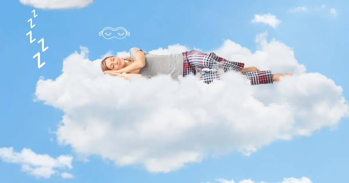 Young woman in pajamas, sleeping contentedly on clouds, with her face mask, and the z z z to her left.